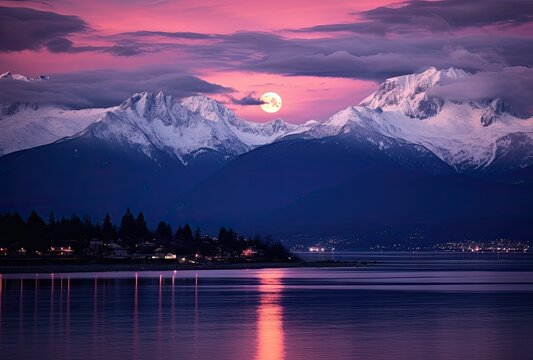 A purple moon setting as snow covered mountains sit atop it, in the style of seaside vistas