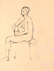 Black charcoal on colored paper quick sketch capturing the grace and poise of a female model in a studio setting. An artistic drawing of the human form.