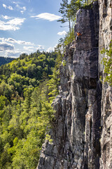 climber on rock wall