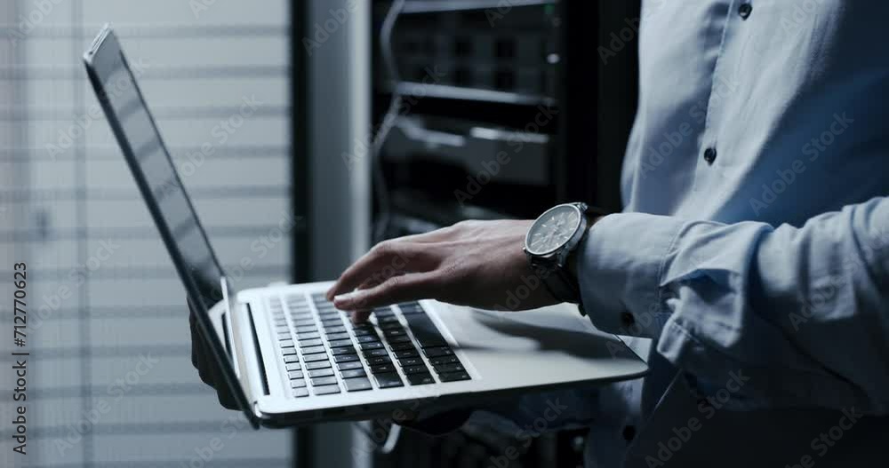 Poster Technician hands, data center and laptop for maintenance, system and hardware or software backup in cybersecurity. Person typing on computer for engineering, coding and programming in a server room