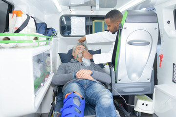 paramedic with patient inside the ambulance