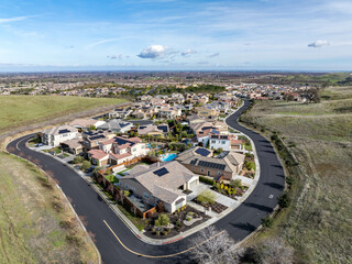Aerial Photographs of an affluent community in California with beautiful houses with solar panels, pools, streets. Great for real estate marketing