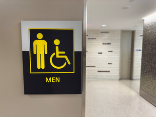 Mens restroom sign on a wall - 712773485