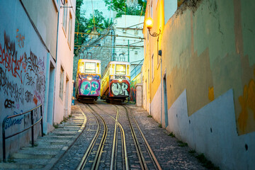 two carriages of the Lavra sidewalk elevator in the city of Lisbon at night.