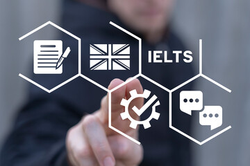 Man using virtual touch screen sees text: IELTS. Concept of IELTS International English Language...