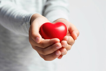red love heart shape in hands