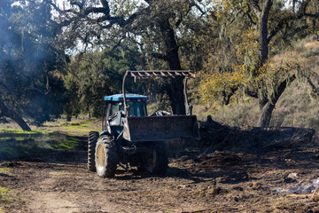Fototapeta na wymiar Tractor TV One Forty on Ranch Landscape