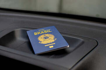 With its blue cover and golden letters, this close-up of the Brazilian passport represents pride...