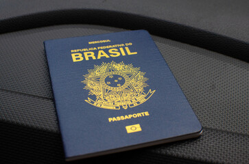 With its blue cover and golden letters, this close-up of the Brazilian passport represents pride...