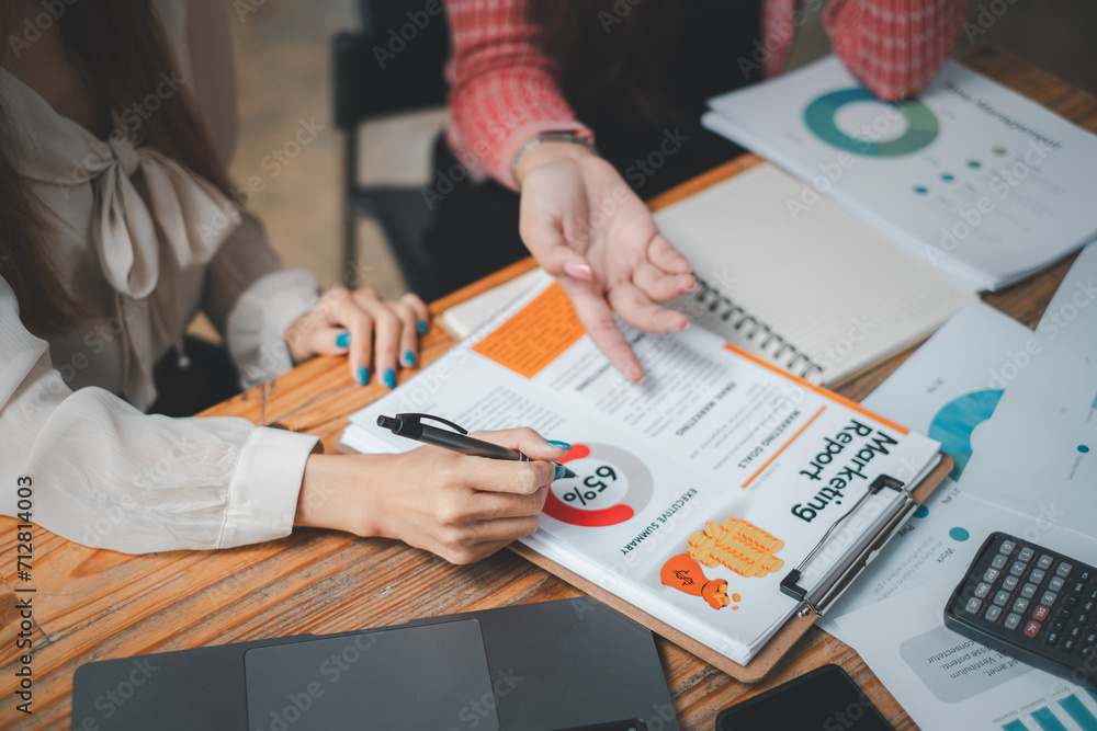 Poster group of business people analysis summary graph reports of business operating expenses and work data