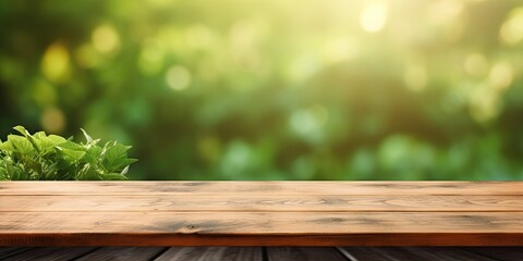 Wooden table with green abstract blur for product display or garden mockup.