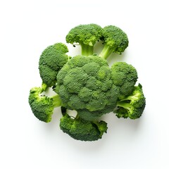 Photograph of broccoli, top down view, wite background