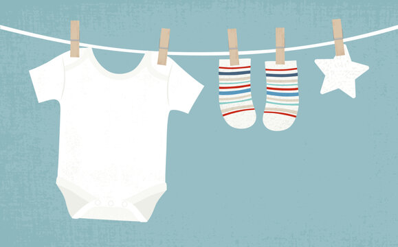 baby clothes hanging on clothesline, blue background clip art preview