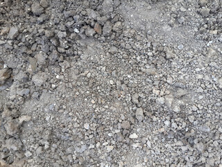 texture of gravel and soil for the road.