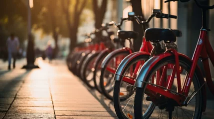 Wandaufkleber Red bicycles parked on the sidewalk at sunset. Generative AI. © Nikolay