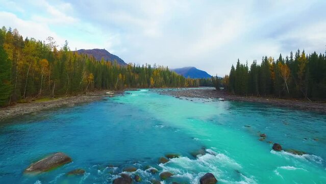 dramatic aerial view of beautiful Kanas Lake in Xinjiang China at autumn in the sunlight