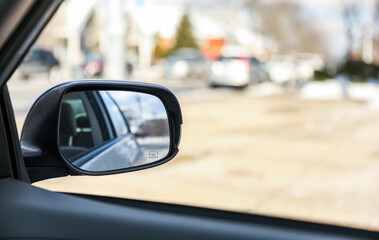 car mirror reflecting past, present, and future, symbolizing the journey of life and the pursuit of...
