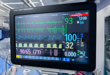 hospital monitor displaying vital signs, emphasizing healthcare, technology, and patient well-being