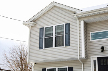 suburban house symbolizing the American Dream, amidst a thriving neighborhood, capturing the essence of homeownership in a dynamic real estate market