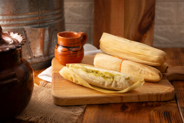 Tamales. hispanic dish typical of Mexico and some Latin American countries. Corn dough wrapped in...
