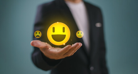 Customer service experience concept, Best Excellent Services. Businessmen hand, happy smile face icon to give satisfaction in service, rating very impressed. Review feedback, best quality, good mood .