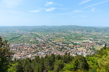 Fototapeta na wymiar View from Mt. Ingino over medieval town of Gubbio and expansive landscape beyond