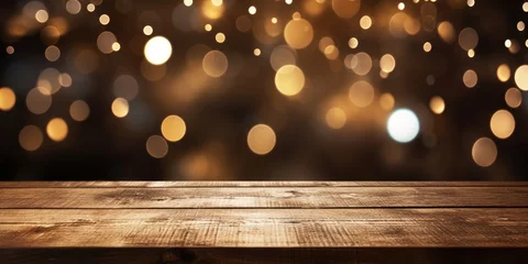 Fotobehang Wooden table in front of shimmering bokeh lights. © Sona