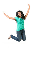 Excited Indian woman jumping for joy.