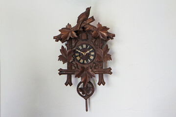 wooden clock on the wall