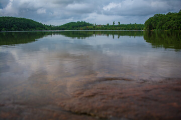 reflection of trees in water landscape photo