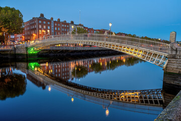 The famous Ha'penny Bridge in Dublin, Ireland, at night