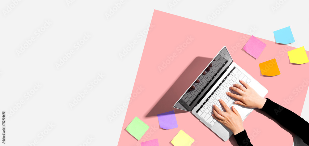 Poster laptop computer with many sticky notes - flat lay