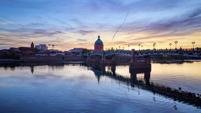 Toulouse day to night sunset timelapse showing the amazing river and historic buildings. France