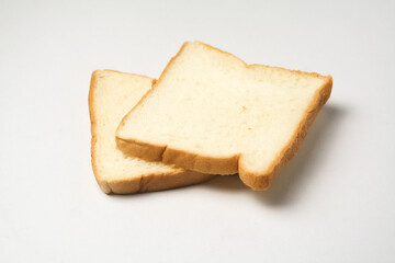 slice of bread 2 served on a white plate, isolated