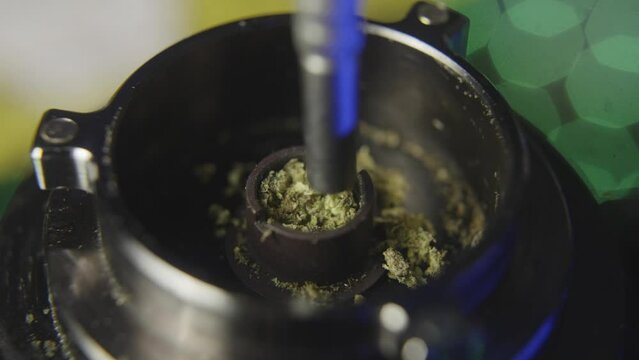 a tool is used to pack marijuana bud into the bowl of a vaporizer to vape the weed