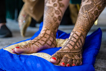 Indian bride's henna mehendi mehndi feet close up