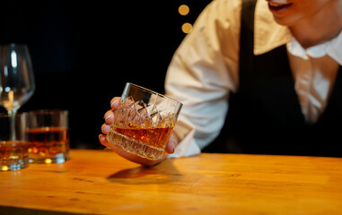 Bartender Serve Whiskey, on wood bar, 