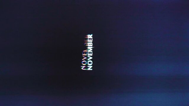 November word glitches out and repeates vertical across dark analog background