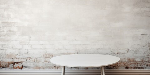 White brick wall background with an empty table.