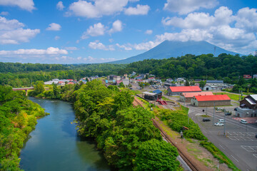 Niseko town with Shiribetsu river viewed from the Niseko Bridge, Niseko, Shiribeshi Subprefecture, Hokkaido, Japan