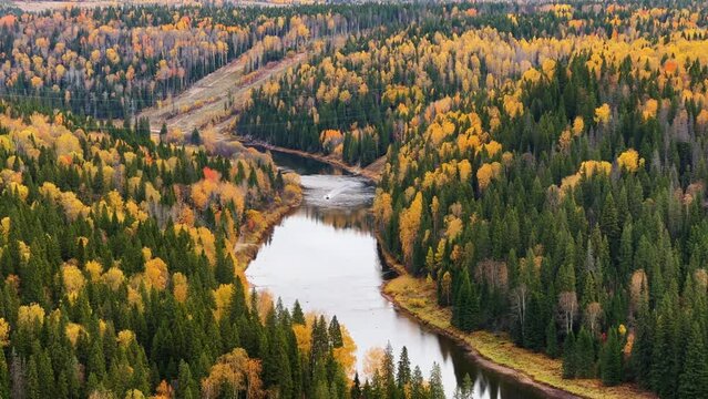 Amazing view of the picturesque Usva River in autumn, near the Usva pillars, flowing through a rocky area in the Perm region, unique landforms, stone pillars. Russia 4K