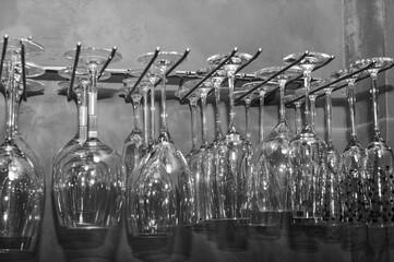 wine glasses hanging in a rack