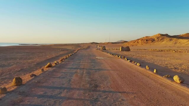 Sandy roadway along the sea in the reserve of Ras Mohammed National Park of Egypt. Tourism travel in Sharm El Sheikh. Vacation rest holiday