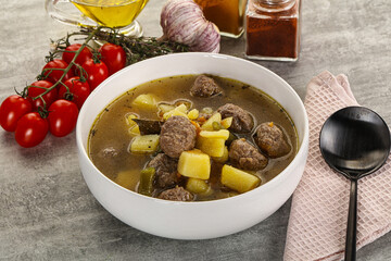 Soup with meatball and potato