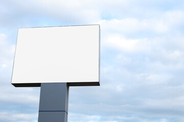 Outdoor billboard mockup on blue sky background 
