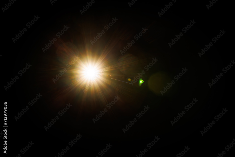 Poster Easy to add lens flare effects for overlay designs or screen blending mode to make high-quality images. Abstract sun burst, digital flare, iridescent glare over black background.