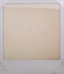 real macro photo of instant film frame surface or exposed film cell, blank or empty film window.