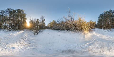 winter full spherical hdri 360 panorama view road in snowy forest with blue evening sky in equirectangular projection. VR AR content