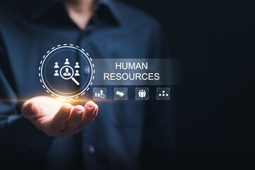 Businessman hold virtual HR word with human resources icon for recruitment process to work...