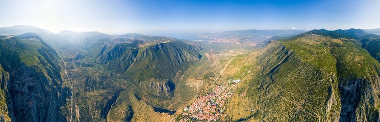Delphi, Greece. Modern city. View of the valley. Sunny weather, Summer morning. Panorama 360....